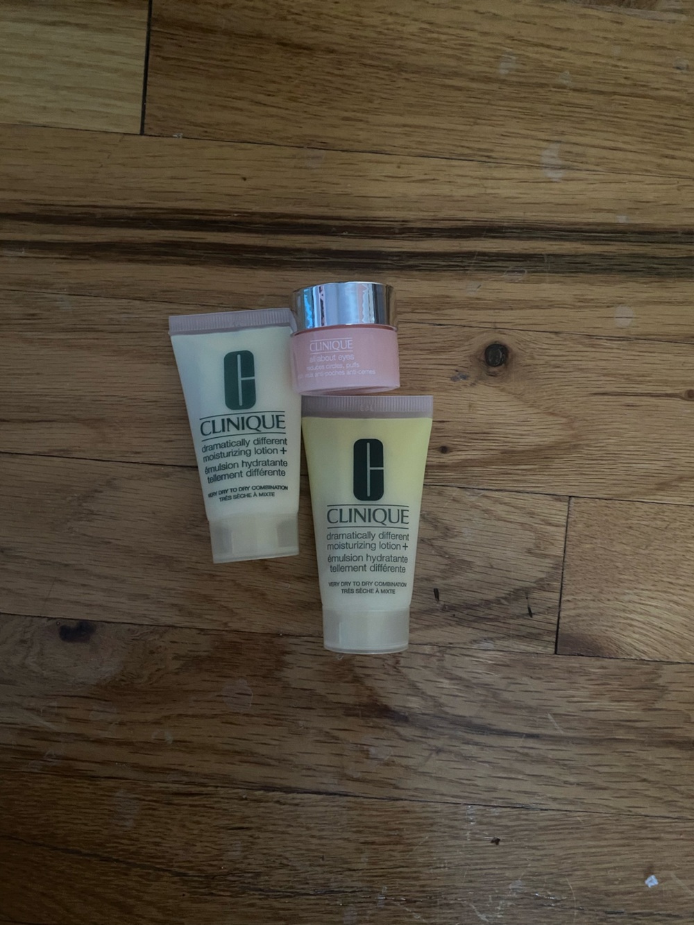 Clinique Yellow Moisturizer Tubes with Pink eye Cream